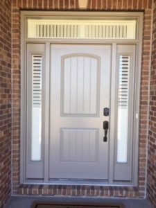 Norman Shutters on Door Sidelights Windows for Front Doors by Columbia Blinds and Shutters in Missouri